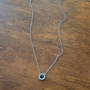 White gold with "floating" diamond
